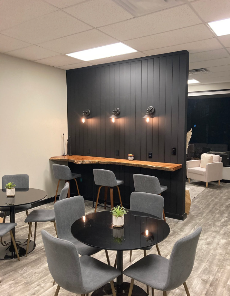 Hope Rock Project gathering area with dark paneled feature wall