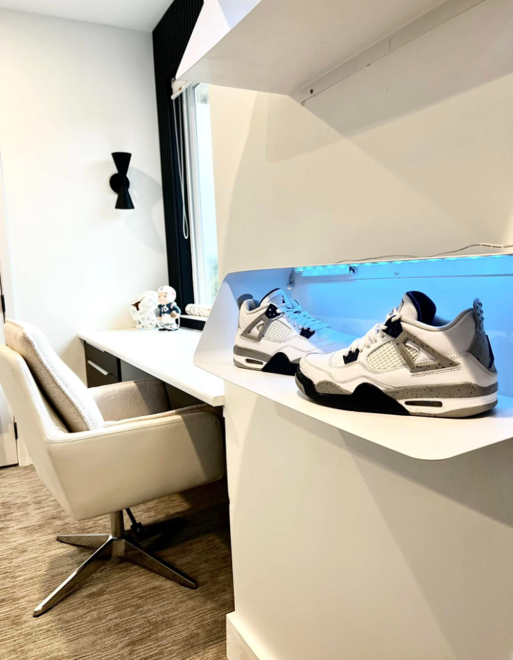 Themed bedroom desk with sneaker display
